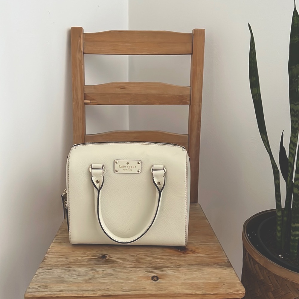 White Kate Spade purse. Alessa Wellesley satchel